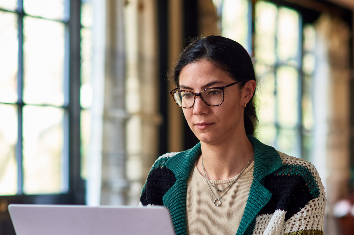 Woman looking at a laptop